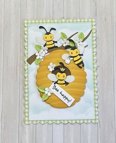 a close up of a card with some bees on it and the words be happy