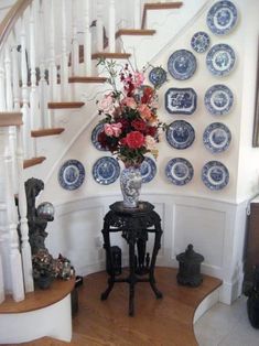 an image of a stairway with blue and white plates on it