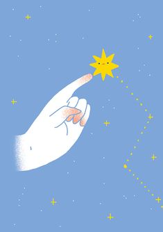 a hand holding a yellow star in the sky with stars coming out of its fingers