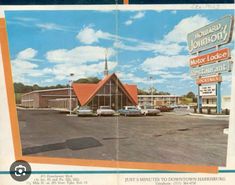 an old photo of a motel with cars parked in the parking lot next to it