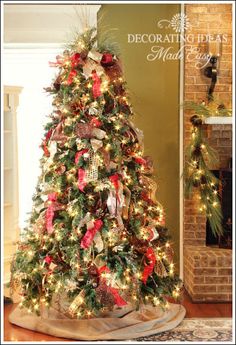 a christmas tree decorated with bows and lights