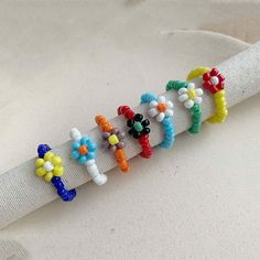 several bracelets sitting on top of a napkin