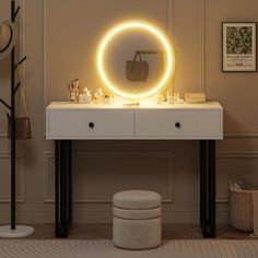 a white vanity with a lighted mirror and stool next to it in a beige room