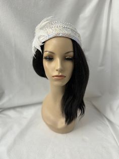 This is a vintage inspired Juliet cap style 1950s - 1960s white iridescent sequin fascinator half hat with a feather  flower ideal for wedding, bridal tea party, mother of the bride, COGIC church hat or any other formal special occasion. Lightweight Design to  be worn either side  Alligator clips underneath or elastic band Easy to wear Can be worn tilted on either side towards the face, as a Fascinator hat. Vintage style in the center of head.  Approx: 15" side by side and 7.5" back and front. Juliet Cap, Hat Tea Party, Bridal Tea Party, Tee Party, Iridescent Sequin, Church Hat, Tea Party Hats, Bridal Tea, Feather Flower