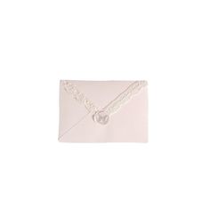 a white envelope with lace on the front and a button in the middle that says i love you