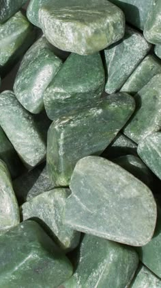 some green rocks that are next to each other