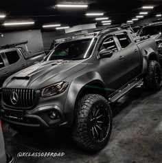 several trucks are lined up in a parking garage