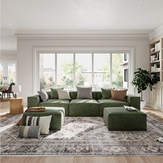 a living room filled with furniture and a large rug on top of a hard wood floor