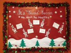 a bulletin board is decorated with christmas decorations