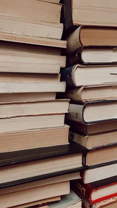 a stack of books sitting on top of each other