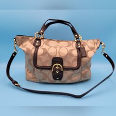 This Coach Campbell Signature Belle Carryall Tote Features A Classic Signature C Pattern On The Exterior Material, With Brown Leather Handles And Straps. The Bag Measures 18 Inches In Width, 12 Inches In Height, And 3 Inches In Depth, Making It An Extra-Large Size Suitable For Carrying All Your Daily Essentials. Additional Measurements Are In The Pictures. The Bag Has A Zip Closure, Ensuring The Safety Of Your Belongings And Gold Hardware For A Touch Of Elegance. It Also Has Inner Pockets And An Inside Pocket With A Zipper Closure For Added Convenience. It Also Has An Outer Pocket With A Snap Closure. The Sateen Lining In Brown Color Complements The Exterior Perfectly. It's New Without Tag Carryall Tote, Color Complement, Coach Bags, Leather Handle, Brown Color, Inside Pocket, Brown Leather, Bag Lady, Shoulder Bag