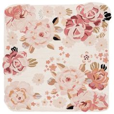 an area rug with pink flowers and leaves on the floor in front of a white background