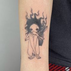 a person with a tattoo on their arm