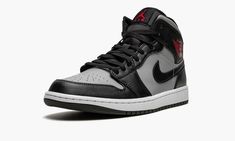 The Air Jordan 1 Mid “Shadow/Red” is a mostly two-tone, grey-and-black colorway of Michael Jordan’s first signature shoe in the mid-top silhouette that draws inspiration from the shoe’s original “Shadow” design.  The “Shadow/Red” is a clean, versatile look for the popular mid-top Air Jordan 1 that features Particle Grey leather on the perforated toe, mid-panel, collar, and heel.  Contrasting black leather appears on the overlays and Swoosh branding.  The two-tone appearance is similar, but not a Jordan 1 Mid Shadow Red, Jordan Wings, Original Air Jordans, All Jordans, Nike Air Jordan 1 Mid, Jumpman Logo, Air Jordan 5 Retro, Jordan 2, Red Sneakers