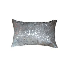 a pillow with silver sequins on the front and back, sitting on a white background