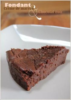 a piece of chocolate cake on a white plate