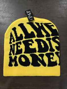 All We Need Is Money beanie cap (other colors available) Trendy Letter Print Beanie, Letter Print Beanie Hat, One Size Fits Most Letter Print Beanie, Letter Print Beanie Hat One Size Fits Most, Streetwear Beanie With Letter Print, Casual Yellow Hat One Size, Letter Print Beanie For Streetwear, Trendy Yellow Hat For Streetwear, Casual Yellow Hat With Letter Print