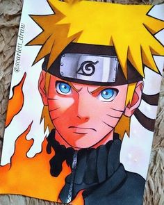 a drawing of naruto is shown on the floor next to a piece of paper