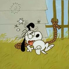 a cartoon dog is playing with a rope in front of a house and stars on the roof