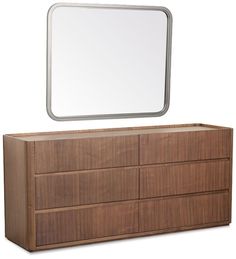 a dresser with a mirror on top of it