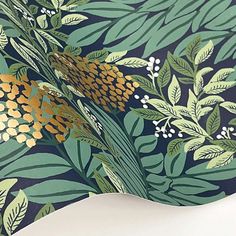 an image of a wallpaper with flowers and leaves on it's back side