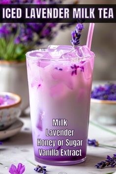 a purple drink with lavender flowers in the background and text overlay reads iced lavender milk tea