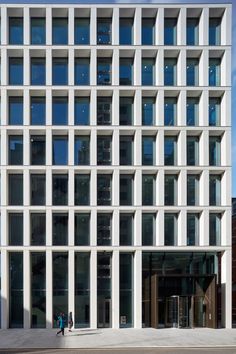 a large white building with lots of windows