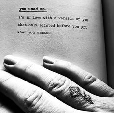 a person's hand holding an open book with the words you used me on it