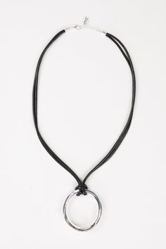 The Eleanor Pendant Necklace in Black/Silver is a stylish accessory that will add a touch of sophistication to any outfit. The double corded necklace features a circular silver pendant and an adjustable clasp closure for a comfortable fit. With its long length, this necklace is perfect for layering or wearing on its own. Double corded necklace Circular silver pendant Adjustable clasp closure Long length for versatile styling Modern Silver Necklace With Adjustable Cord, Silver Necklaces With Adjustable Cord For Everyday, Silver Necklace With Adjustable Cord For Everyday, Modern Circle Necklace With Adjustable Fit, Jewelry Lookbook, Cord Necklace, Stylish Accessories, Black Silver, Silver Pendant