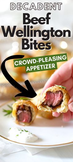 a hand holding a piece of meat wellington bites on a plate with the title, crowd pleasing appetizer