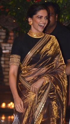 Deepika In Sabyasachi, Gold Net Saree, Lehnga Ideas, Saree With Black Blouse, Classy Sarees, Black Saree Blouse, Sabyasachi Sarees, Indian Celebrity, Fashionable Saree Blouse Designs