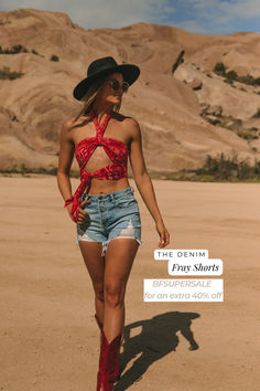 Distressed Cutoff Tops For Summer, Trendy Fitted Shorts For Vacation, Ripped Cutoff Shorts For The Beach, Distressed Shorts For Summer, Relaxed Fit Cutoff Shorts For Vacation, Fitted Shorts For Day Out At The Beach, Trendy Ripped Jean Shorts For The Beach, Ripped Denim Top For Summer, Trendy Ripped Beach Shorts