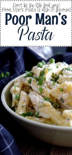 a bowl filled with pasta covered in parmesan cheese