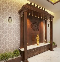 a golden statue sitting on top of a wooden bench in front of a white wall