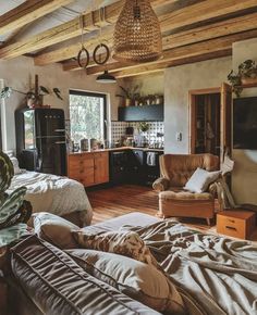 a living room filled with furniture and a flat screen tv