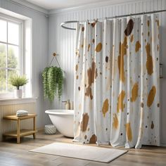 a white bath tub sitting next to a shower curtain in a bathroom under a window