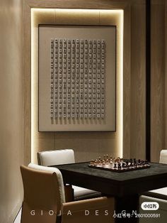 a black table with chairs around it and a chess board on the wall behind it