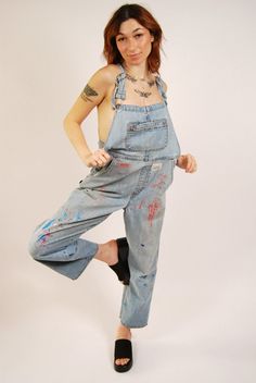 * Size: XL * Vintage 90s women's denim overalls by Arizona. * Over it all. Light wash blue jean overalls with tons of pockets and adjustable straps. Buttons on side of legs, lots of paint stains, and small Croquet Club patch on front. Straight leg.  * Distressed vintage condition. Tons of paint stains; top button holes on both sides have been pretty ripped open so don't really button that well, but there's two more buttons on each side! * Material: 100% cotton. Slight stretch. - MEASUREMENTS - WAIST (doubled) approx 36" HIPS (doubled) 39" LENGTH (top of bib to bottom of leg) 48" PANT INSEAM 28.5" ---- FEEL FREE TO MAKE A REASONABLE OFFER ON ANY ITEM ~ Returns accepted on all items ~ ~ Ask about discounts on multiple item orders ~ Painters Overalls, Blue Jean Overalls, Womens Denim Overalls, 90s Denim, Jean Overalls, Jean Vintage, Overalls Women, Denim Overalls, Denim Women