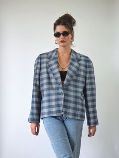 "Vintage blue plaid blazer Made of 45% wool and 55% polyester. Large size. Tag: Zagreb, Made in Yugoslavia Blazer is one of a kind vintage piece. In good vintage condition. There is a small brown stain next to the collar as you can see on the last picture. You will receive the exact item shown in the picture. All the clothes in my shop are washed and stored with care. For reference, model is 5'7\" and measures 32-28,5-36. Wears US size 8, UK size 10, EU size 38. Estimated size: L To be sure it w Chic Plaid Wool Blazer, Retro Plaid Wool Blazer, Retro Wool Plaid Blazer, Retro Plaid Blazer For Work, Womens Red Blazer, Dark Blue Blazer, Leather Blazer Women, Black Leather Blazer, Floral Print Blazer