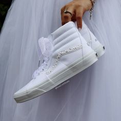 Make Your Day Extra Special With These Beautiful And Unique Custom Bridal Sneakers. Please Visit: Solecraftstudio.Com For A Better Customization Experience, And Better Prices. Why Settle For Ordinary When You Can Have Extraordinary? Elevate Your Wedding Attire With Personalized Sneakers That Not Only Look Fabulous But Feel Incredible Too. Brand New 100% Authentic Vans Sk8-Hi Canvas With Box! Rhinestones/Pearls Swoosh Bridal Custom Made-To-Order Sneaker. Satin Or Tulle Laces! Style: 4 Stripes + L Sneakers For Wedding Brides, Bride Vans Shoes, Lace-up Leather Wedding Shoes, White High-top Sneakers For Wedding, White High-top Wedding Sneakers, Custom Wedding Sneakers With Round Toe And Laces, Custom White High-top Wedding Sneakers, Elegant White High-top Sneakers, Vans Wedding Shoes The Bride