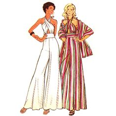 two women standing next to each other wearing long dresses and one has her hands on her hips