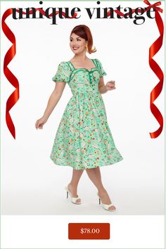 This adorable 1940's style swing dress is crafted in a lightweight green woven fabric that features a possum print throughout. The bodice features a faux button up front topped with a cute bow and is framed by short elastic puff sleeves. Complete with a back zipper to cinch the waist.Available in sizes XS-5X while supplies last. 1940's Style, Button Front Dress, 1940s Fashion, Cute Bows, Swing Dress, Puff Sleeves, Unique Vintage, Woven Fabric, Puff Sleeve