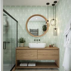 a bathroom with a sink, mirror and towel rack in it's center area