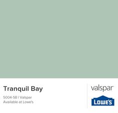 a green paint swatch with the words tranquil bay in white and blue on it