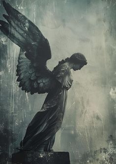 an artistic photo of a statue with wings