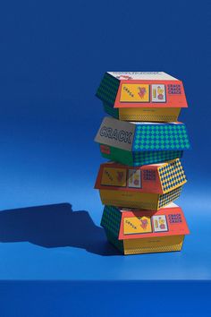 three boxes stacked on top of each other in the shape of a stack with words written on them