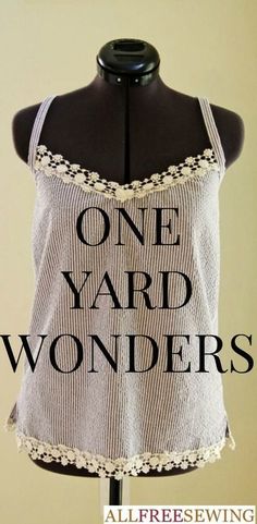 a black and white top with the words one yard wonders on it's chest