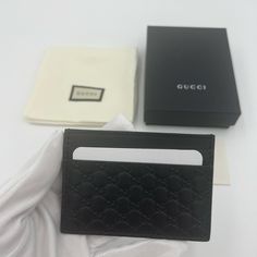 Brand New Authentic Gucci Black Leather Micro Gg Guccissima Embossed Card Case Wallet Style # 262837 Made In Italy Finest Black Calfskin Leather Embossed With Gg Length: 4 In Height: 2 3/4 In 2 Credit Card Slots On Each Side With Deep Compartment In The Middle Gucci Logo & Number Embossed Inside Comes In Gucci Box, Dust Bag And With Authenticity/Care Cards. Designer Gucci Wallets For Business, Classic Gucci Wallets With Interior Card Slots, Classic Gucci Wallets With Card Slots, Luxury Gucci Wallets With Interior Card Slots, Modern Black Gucci Wallet, Gucci Leather Wallets With Rfid Blocking, Gucci Leather Wallet With Rfid Blocking, Gucci Luxury Wallets With Rfid Blocking, Designer Gucci Wallet With Rfid Blocking