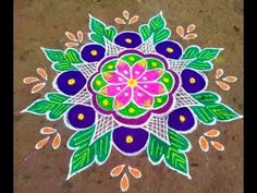 a colorful flower design painted on the ground