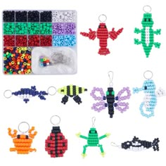 beaded keychains with different designs and colors in them on a white background